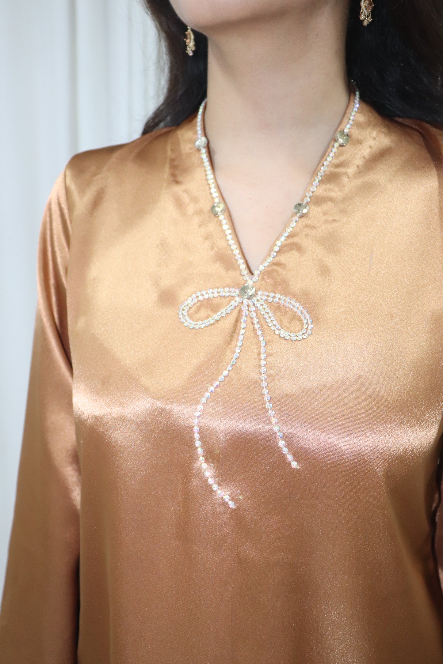 Haseena Kurti- golden short satin kurti with bow embroidery